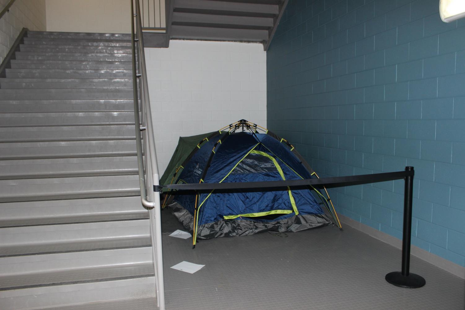 The mysterious tent appeared around two months ago. Rumors have been circulating among students about what it could hold. “Between third and fourth period my friends and I would sneak by the stairwell to see if anyone was there, ” junior Elena Harris said.