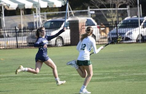  Kaila Stasulli is a defender on girls varsity lacrosse even though Stasulli is only a freshman. “Being on varsity is definitely a challenge but it is also very fun,” freshman Stasulli said.

