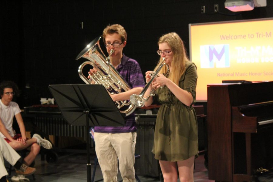 The+Tri-M+Honor+society+held+an+induction+ceremony+on+May+14th.+Casey+Swartz+and+Heather+Jones+played+a+duet+together.