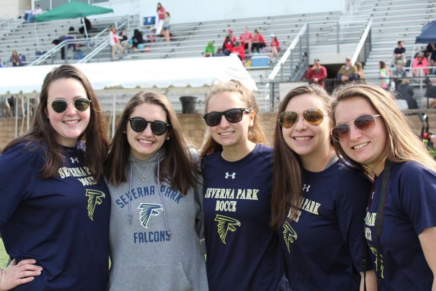 Part of Severna Park’s Team three gather for a picture before the last game. Seniors Elle Johnson (left), Julia Myers (second from left) and Elisabeth Eufemia (second from right) all gather for their last game of the season. “I’ve been apart of Unified Sports for 12 seasons, and it has become a big part of my life throughout high school” Eufemia said.