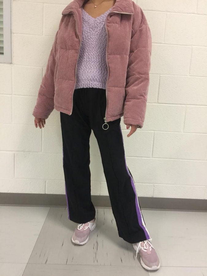  In this outfit, I paired these pastel Nikes with these loose-fitting track pants to tie in the outfit’s pink and purple tones. Super lightweight and durable, Nikes make a long day of running around comfortable and stylish.