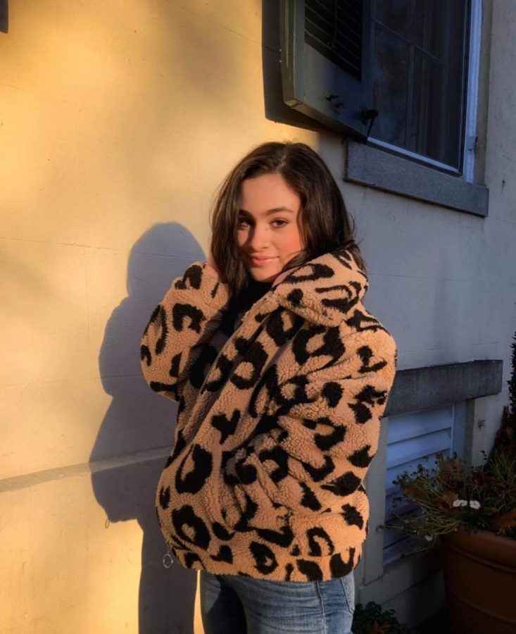 Senior Sofia Urrutia styling a leopard-print teddy coat. Being a Pinterest-guru. Urrutia looks forward to making her outfits. “I love how the jacket adds an element of chic style to any winter outfit while also keeping me super warm,” Urrutia said.