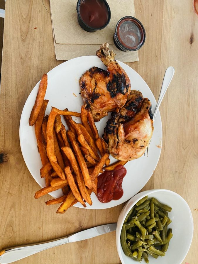 A+meal+that+consists+of+half+of+a+barbecued+chicken%2C+sweet+potato+fries+and+green+beans+along+with+ketchup+and+extra+barbecue+sauce.+Adam%E2%80%99s+Ribs+is+a+family+owned+and+operated+restaurant+that+started+in+Edgewater%2C+MD+and+grew+to+five+more+locations+in+Maryland.+The+food+is+high+quality+and+is+known+for+its+BBQ+entrees+and+delicious+sides.