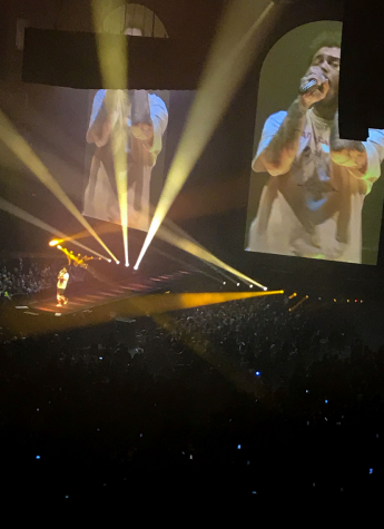 Post Malone on stage at a Washington D.C. stadium singing his latest album named “Hollywood’s Bleeding.” He went on tour to gain publicity for his new album, he also debuted his new tour merch that sold out very quickly. He had a show in Maryland on Feb 27, which featured Tyla Yaweh and Swae Lee. 