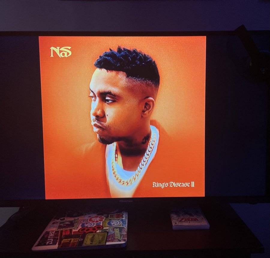 King’s Disease II album cover displays Nasir Jones’ head and shoulders on an orange background. KD was released on August 21, 2020, with the sequel dropping nearly a year later on August 6, 2021. Nas’ rap career started around 1994 with “Illmatic” and the single “Halftime” and he continues to put out high quality music, no doubt pleasing and shocking long-time fans.
