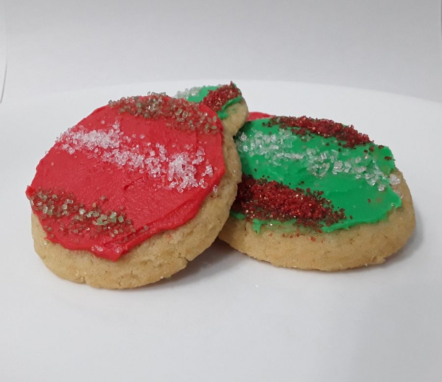This cookie was made with a simple sugar cookie base, red icing and minimal sprinkles. It’s that easy. If you have any extra sprinkles of any color, don’t be afraid to use them, even if they might not fit in with a winter holiday theme. Most cookies won’t hold up with tons of icing and sprinkles and won’t be that fun to eat. Keep it simple and don’t stress about making it look professional. As long as you have fun, make some cookies and don’t make a mess of the kitchen, any cookie decorating is a win. 
