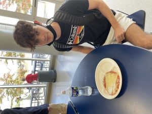 Eric Dulin eating a school lunch meal in Severna Park High School’s cafeteria. 