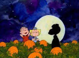 Frame from “It’s the Great pumpkin, Charlie Brown,” released in 1966, only 25 minutes long. This frame features Charlie Brown, his little sister Sally Brown, and the shadow of their dog Snoopy. 