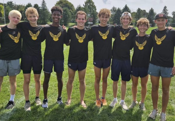 Picture from the PTXC meet on 9/9 up in PA. This is the varsity cross country team photo. FROM LEFT TO RIGHT- Stephen Nunn 2025, Dylan Newhard 2025, Ty Miller 2026, Ryan Crowley 2024, Leo Havens 2025, Caden Lazzor 2025, Cooper Alahverdian 2025, Taylor Jarvis 2024. They placed 6th in this meet. Not our normal placement, as you may know. Jarvis was the star of this meet, coming in first with a time of 17:04. “I dont really do it for myself, I do it for everyone else, Jarvis said. 


