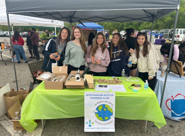  Oliva Hilbert, Anna Willis, Millie Knoepfle, Isabella Elliot, and Giuliana Newton, running the Earth Day Festival booth at Earleigh Heights fire Department. They taught kids how to make recycled bird feeders out of water bottles. 
