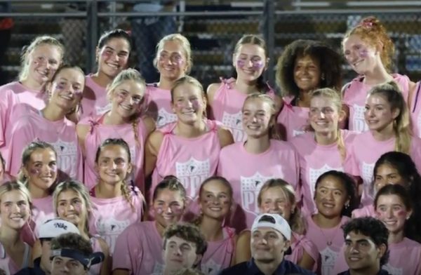 The Powder Puff game against the class of 2026 and 2027 group photo. 