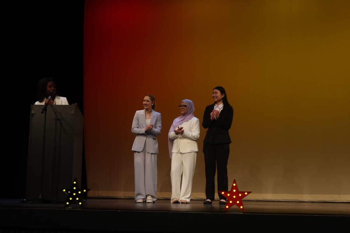 The three SMOB finalists, Olivia Takash, Sara Hamdaoui and Stella Chen on stage after their victories were announced. They will progress to the final round where all Anne Arundel County students will get the chance to vote based on pre recorded speeches and a Q&A. One finalist, Sarah Hamdaoui said, “My goal is to just uplift and advocate for students across the county who maybe aren’t able to do so themselves.”